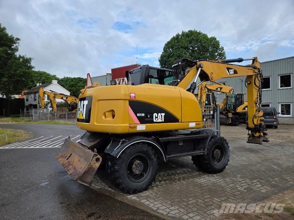 CAT M313D Колісні екскаватори
