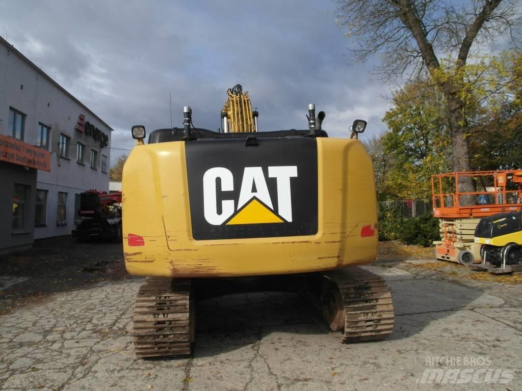 CAT 323 EL Гусеничні екскаватори