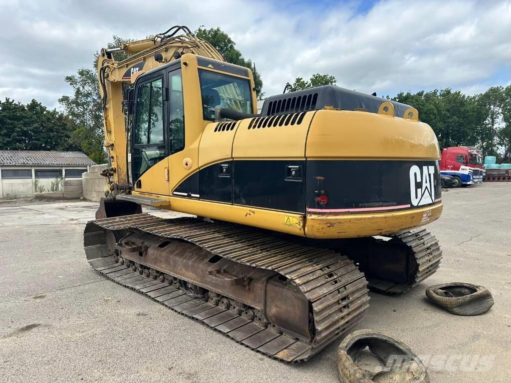 CAT 318 C L Гусеничні екскаватори