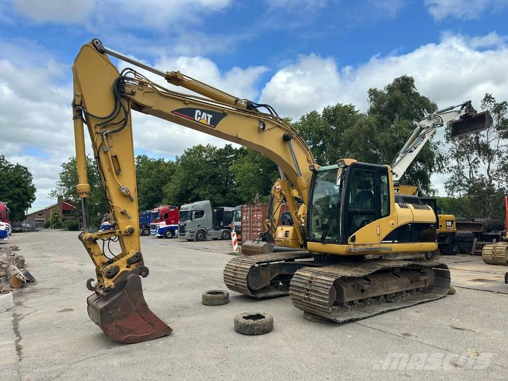 CAT 318 C L Гусеничні екскаватори