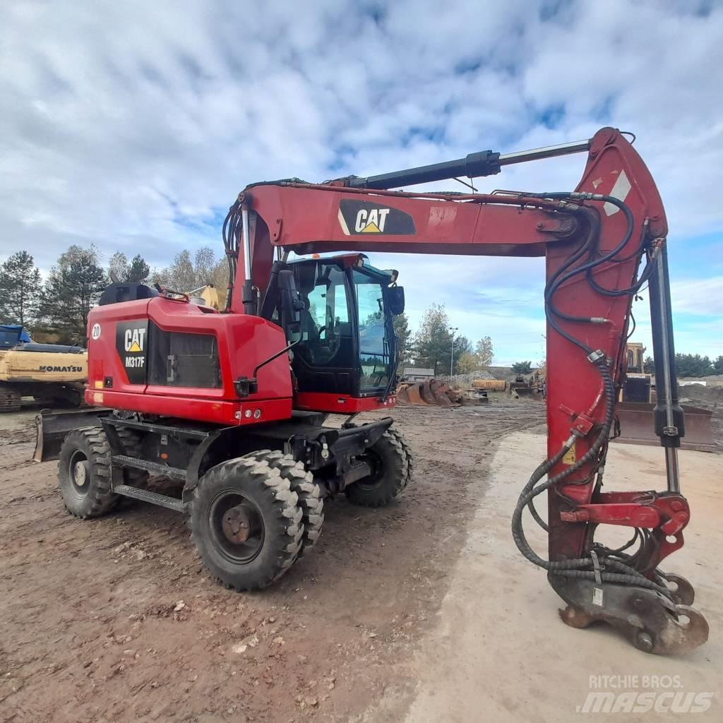 CAT M317 Колісні екскаватори