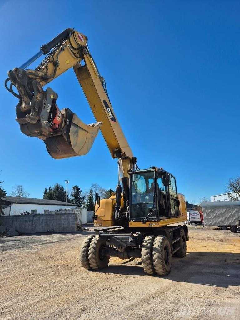 CAT M322F Колісні екскаватори