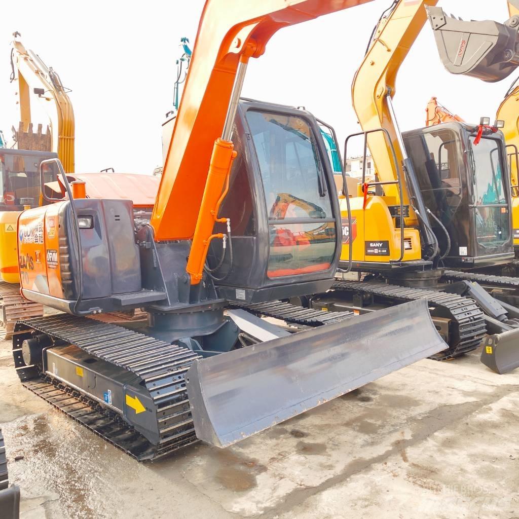 Hitachi ZX70 Середні екскаватори 7т. - 12т.