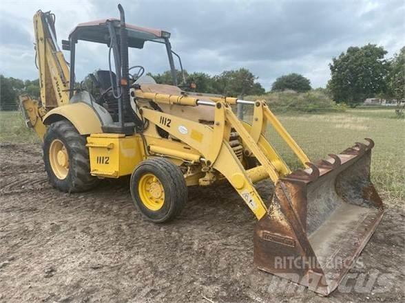 Komatsu WB140 Екскаватори-навантажувачі