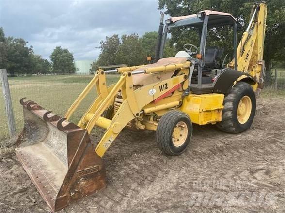Komatsu WB140 Екскаватори-навантажувачі