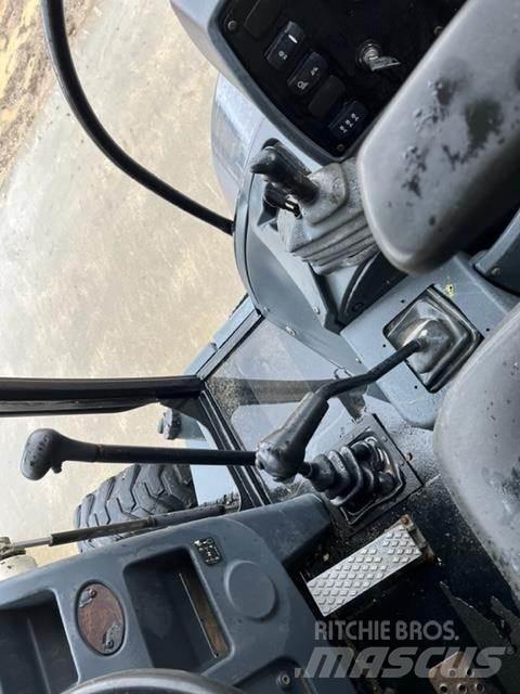 Terex TLB840R Екскаватори-навантажувачі