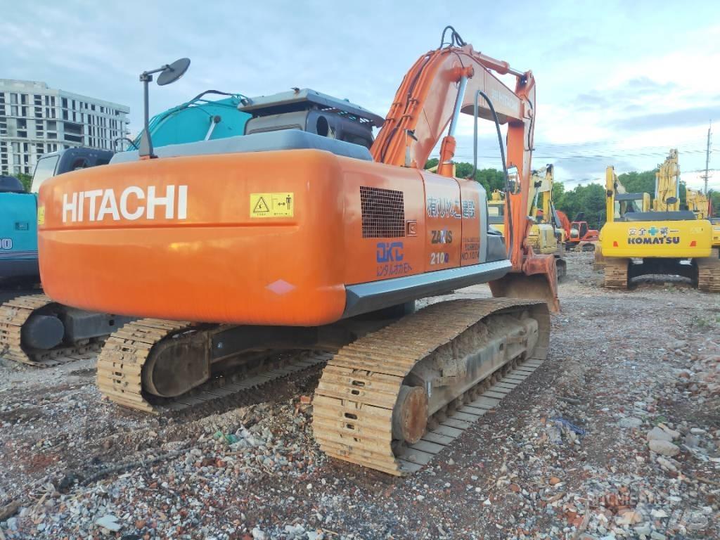 Hitachi ZX 210 Гусеничні екскаватори