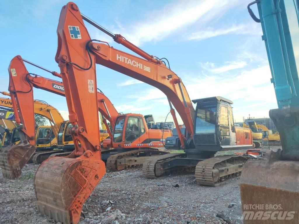 Hitachi ZX 210 Гусеничні екскаватори