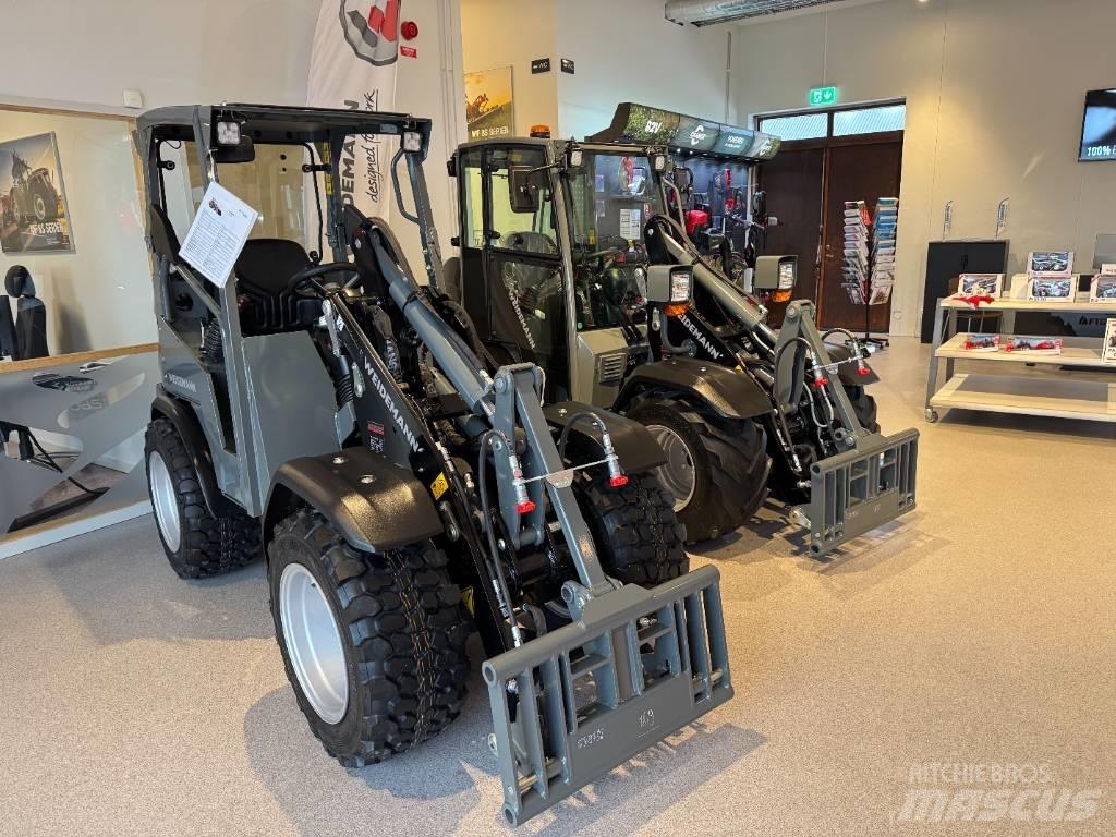 Weidemann 1260 LP Багатофункціональне обладнання для вантажних і землекопальних робіт