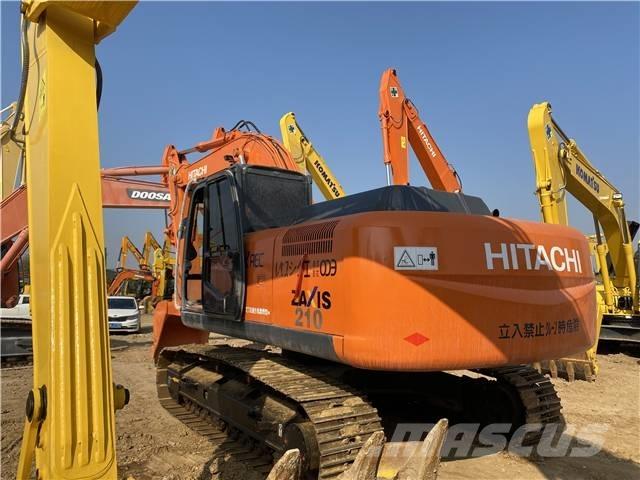 Hitachi ZX210 Гусеничні екскаватори