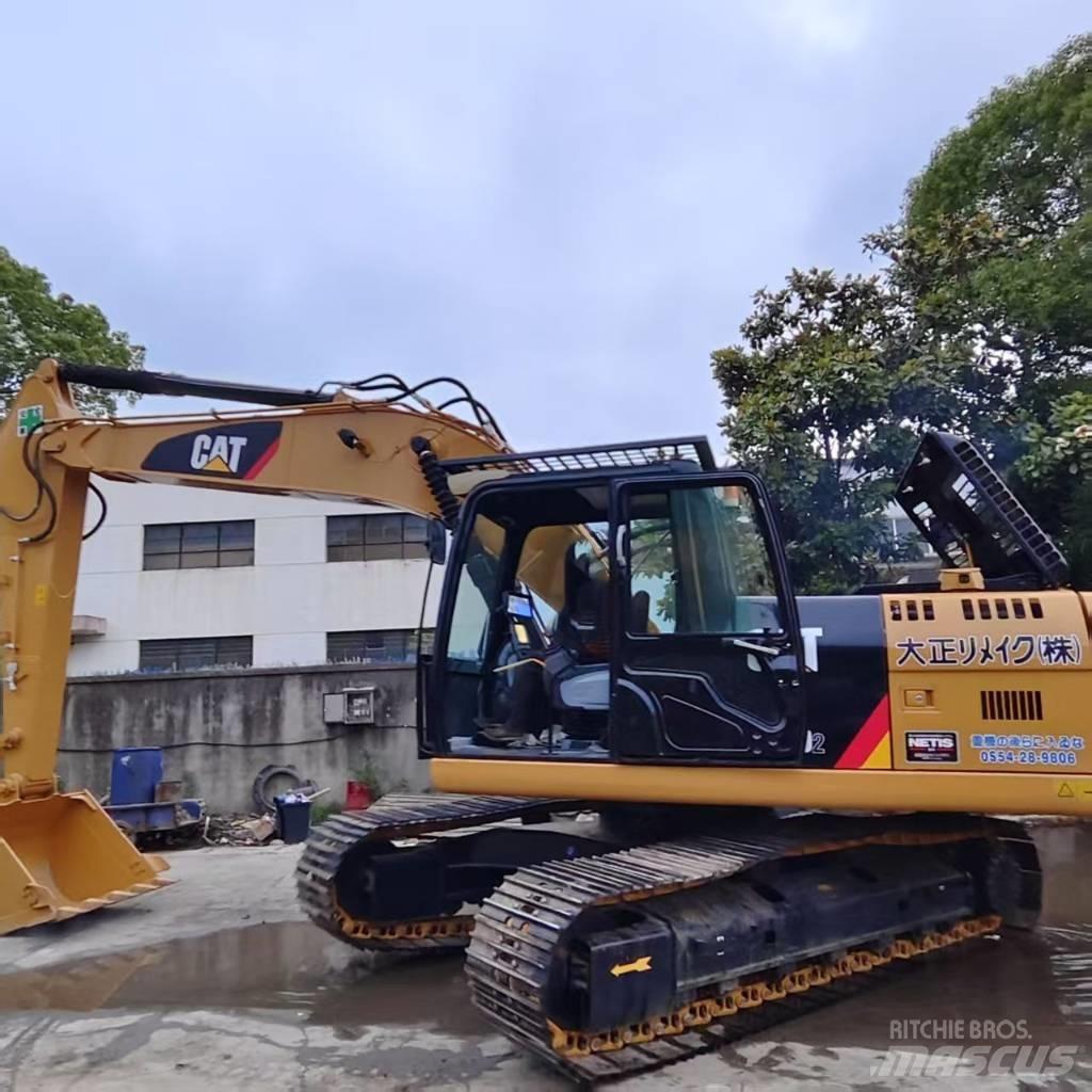 CAT 320 Гусеничні екскаватори