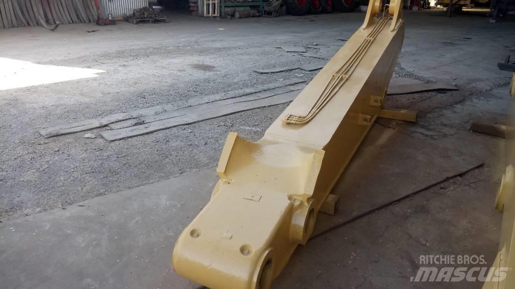 CAT 245 Бони і ковші