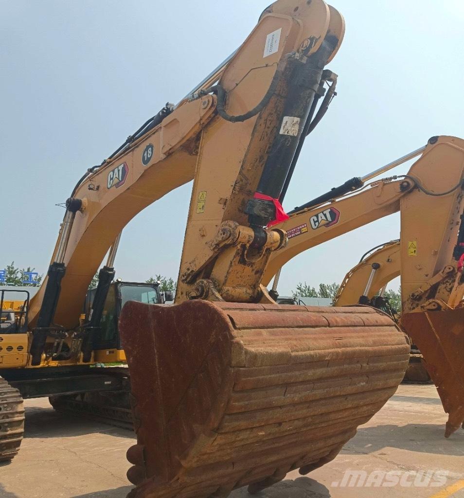 CAT 374 Гусеничні екскаватори