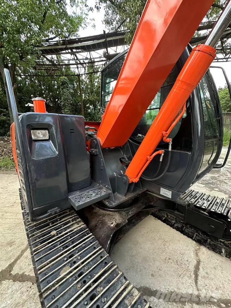 Hitachi 70 Гусеничні екскаватори