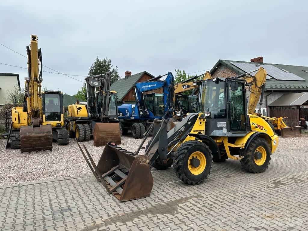 New Holland W 70 TC Фронтальні навантажувачі