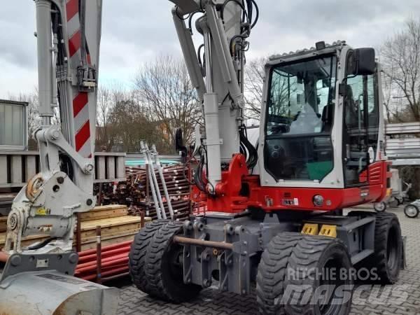 Takeuchi TB 395 W Колісні екскаватори