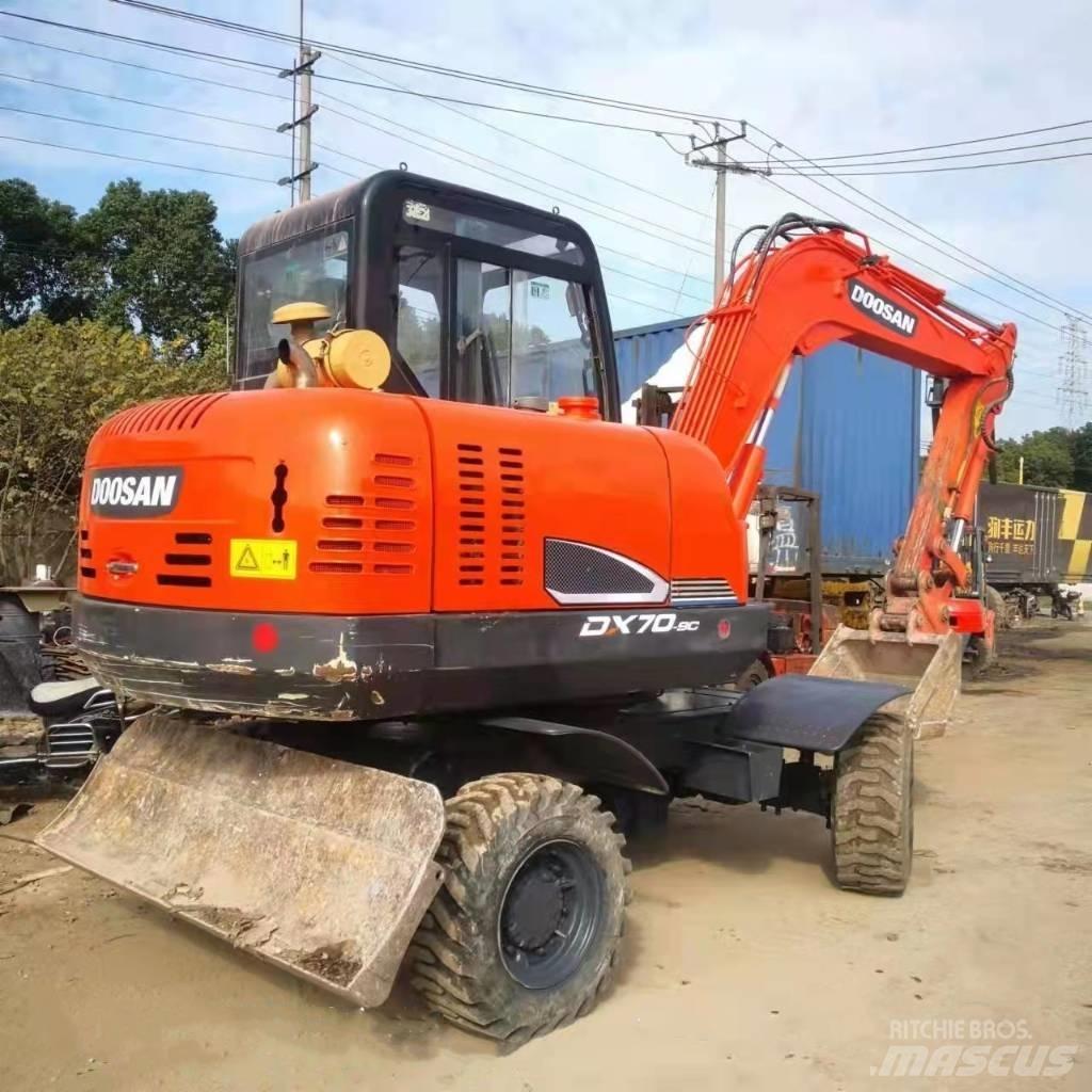 Doosan DX70W-9C Колісні екскаватори