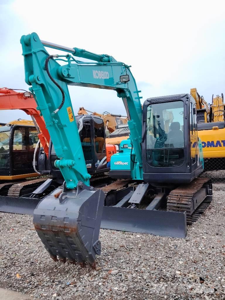 Kobelco SK75 Середні екскаватори 7т. - 12т.