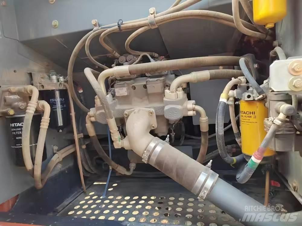 Hitachi ZX 200 Гусеничні екскаватори