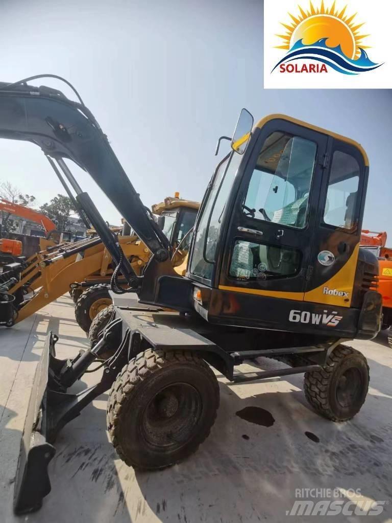 Hyundai R60W vs Міні-екскаватори < 7т