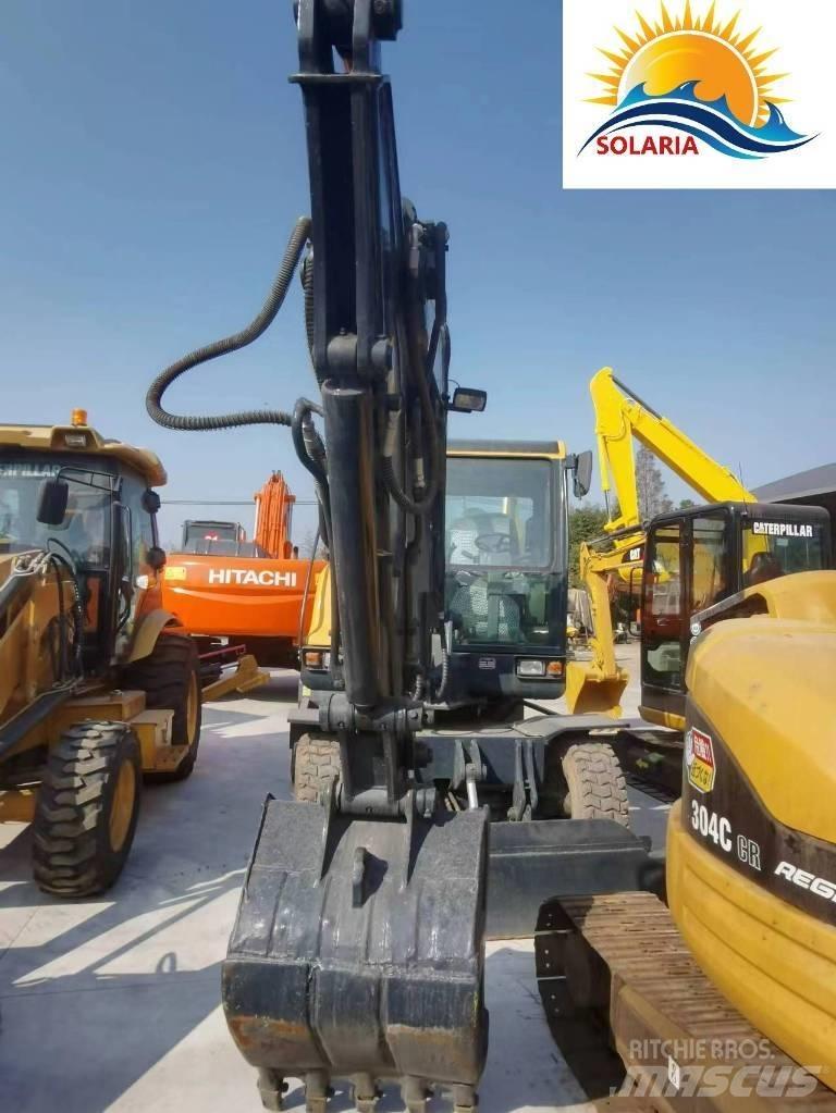 Hyundai R60W vs Міні-екскаватори < 7т