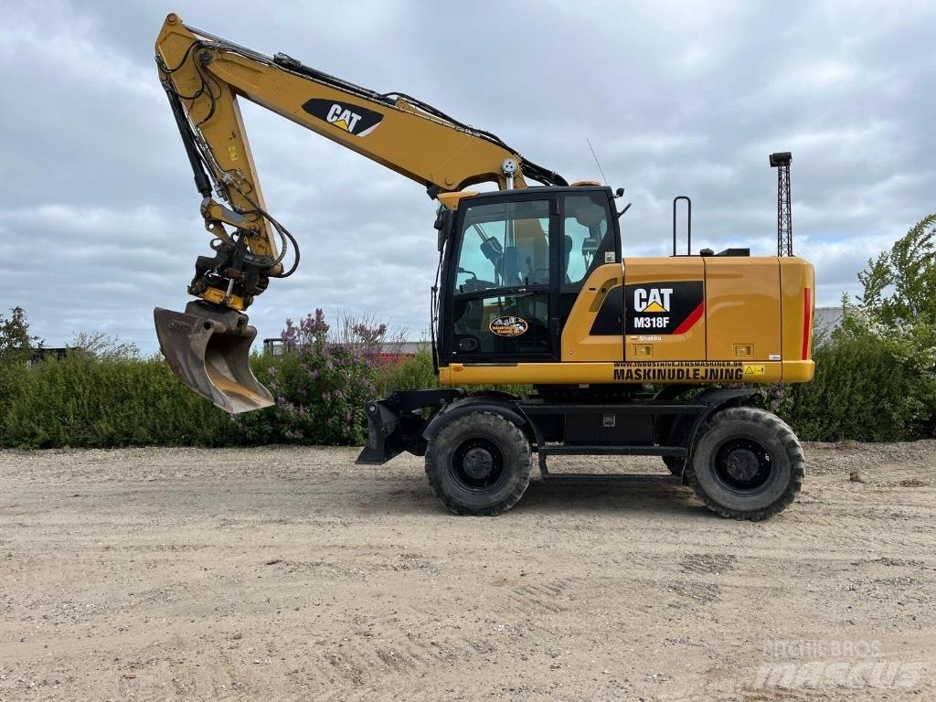 CAT M 318 F Колісні екскаватори