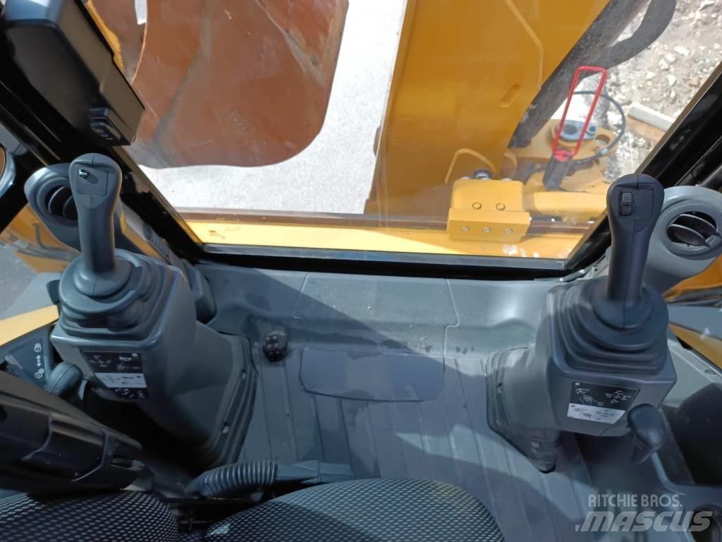 CAT 432 Екскаватори-навантажувачі