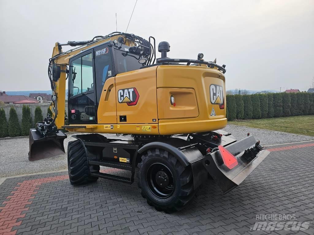 CAT M 315 F Колісні екскаватори