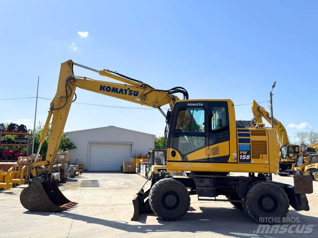 Komatsu PW 158-11 Колісні екскаватори
