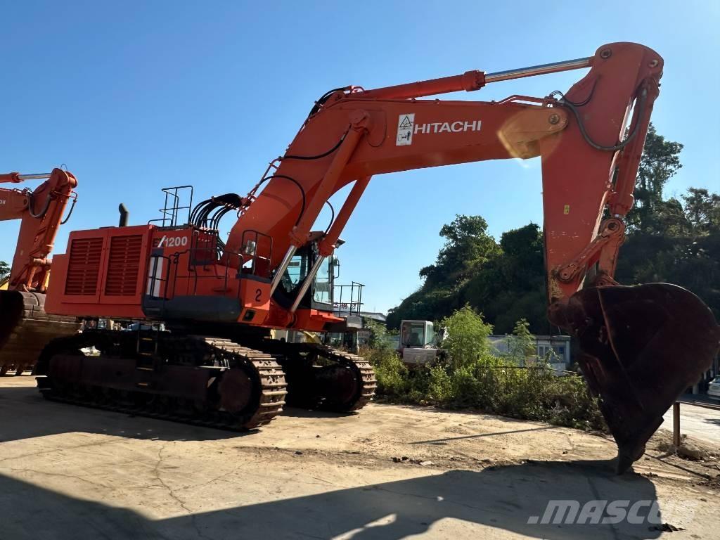 Hitachi EX 1200 Гусеничні екскаватори