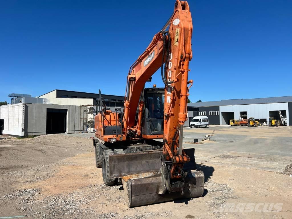 Doosan DX 140 W Колісні екскаватори