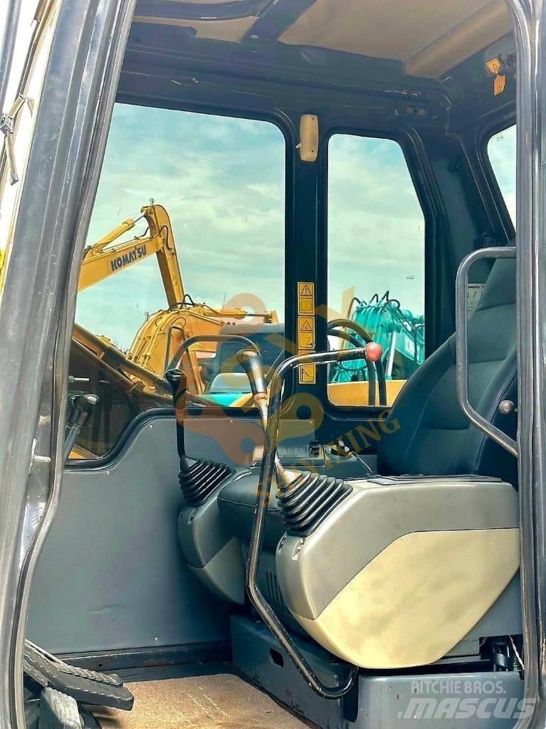 Komatsu PC 60 Гусеничні екскаватори