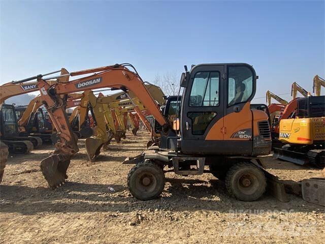 Doosan DX60W Міні-екскаватори < 7т