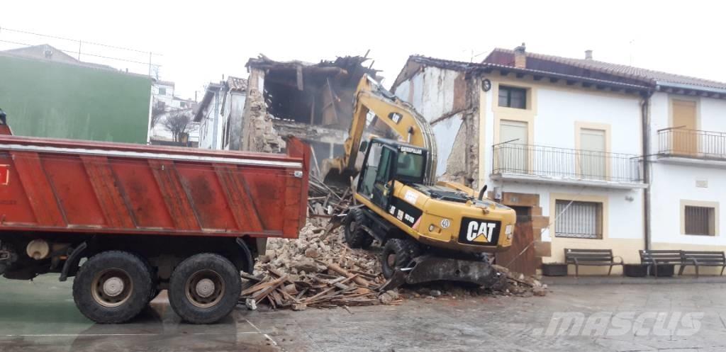 CAT M318d Колісні екскаватори