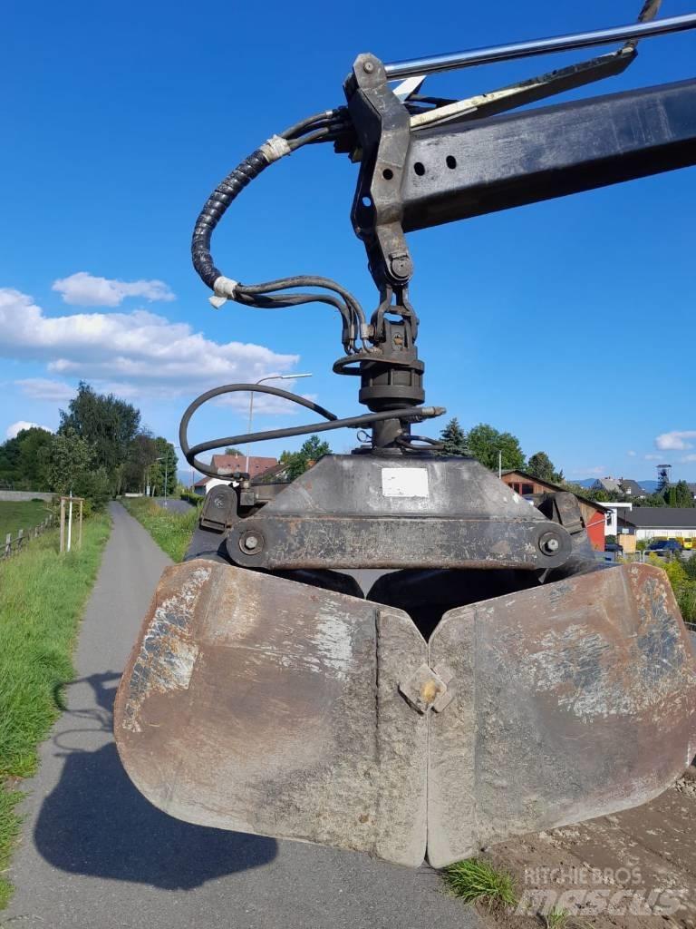 Fassi 130 Крани вантажників