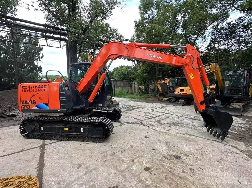 Hitachi 70 Гусеничні екскаватори