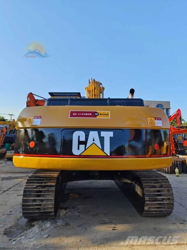 CAT 325 C Гусеничні екскаватори