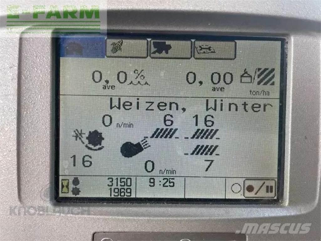 John Deere c670i Зернозбиральні комбайни