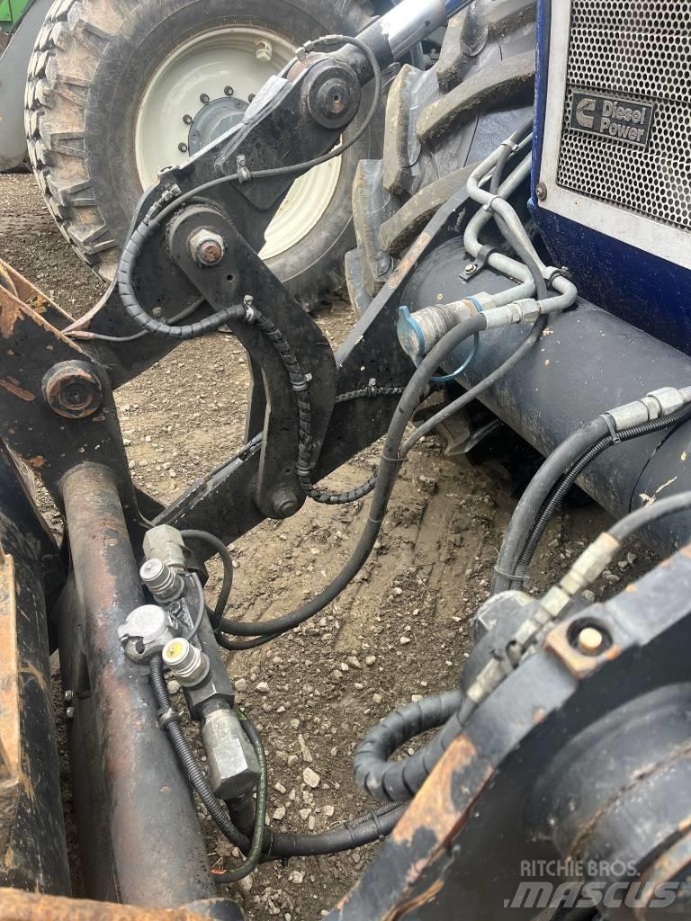 Huddig 1260 B Екскаватори-навантажувачі