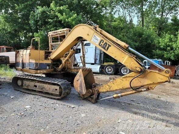 CAT E 70 B Гусеничні екскаватори