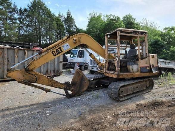 CAT E 70 B Гусеничні екскаватори