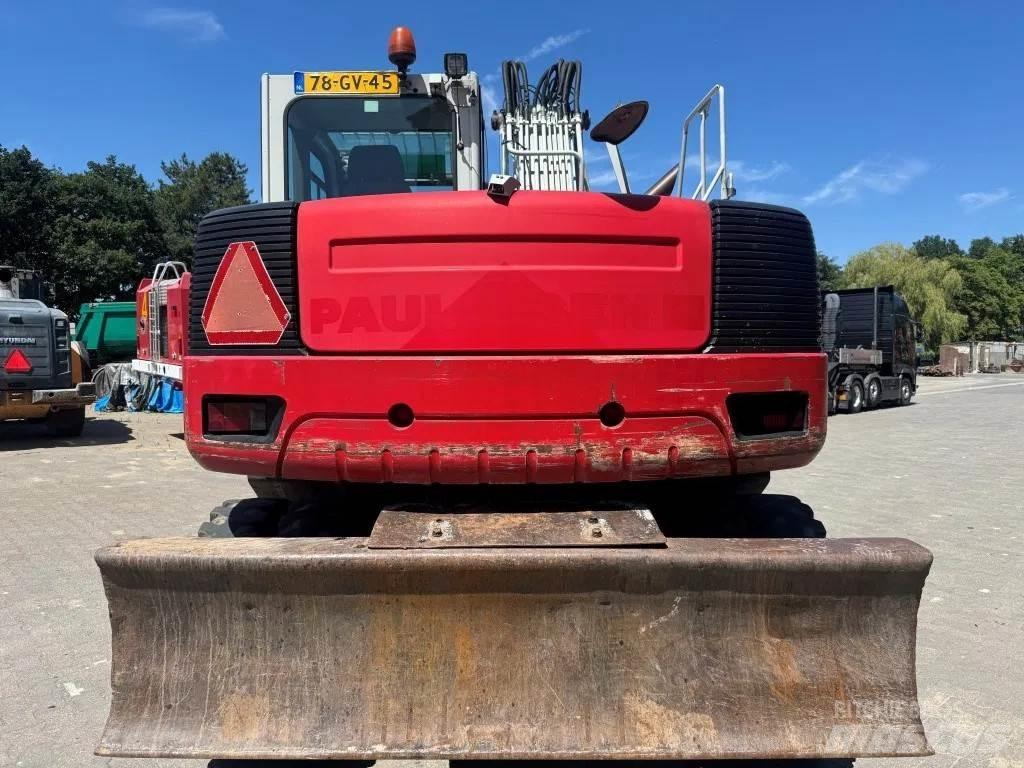 Takeuchi TB1160W Колісні екскаватори