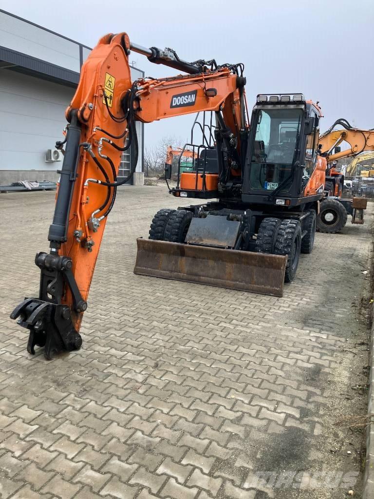 Doosan DX140W-7 Колісні екскаватори