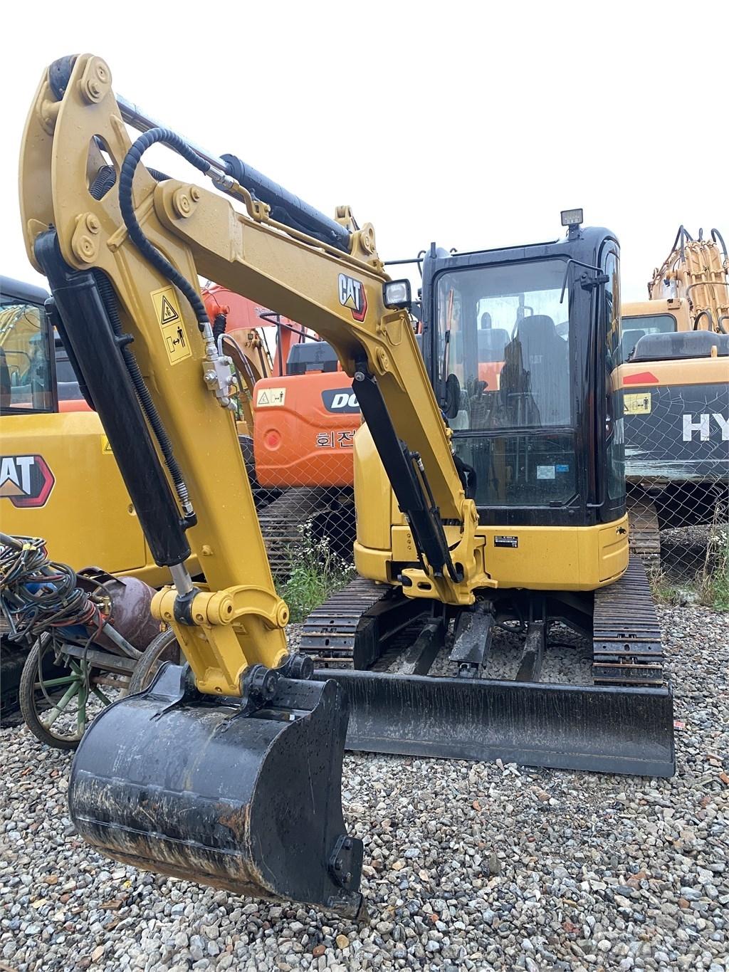 CAT 303E Гусеничні екскаватори