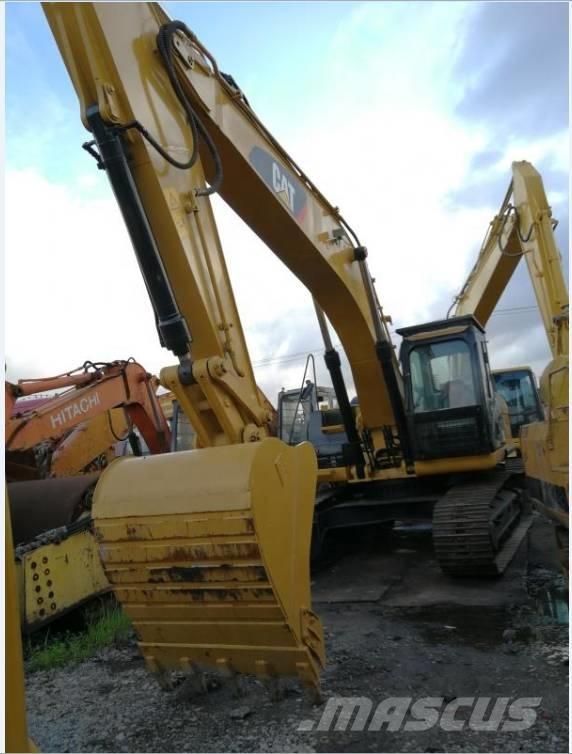 CAT 330DL Гусеничні екскаватори