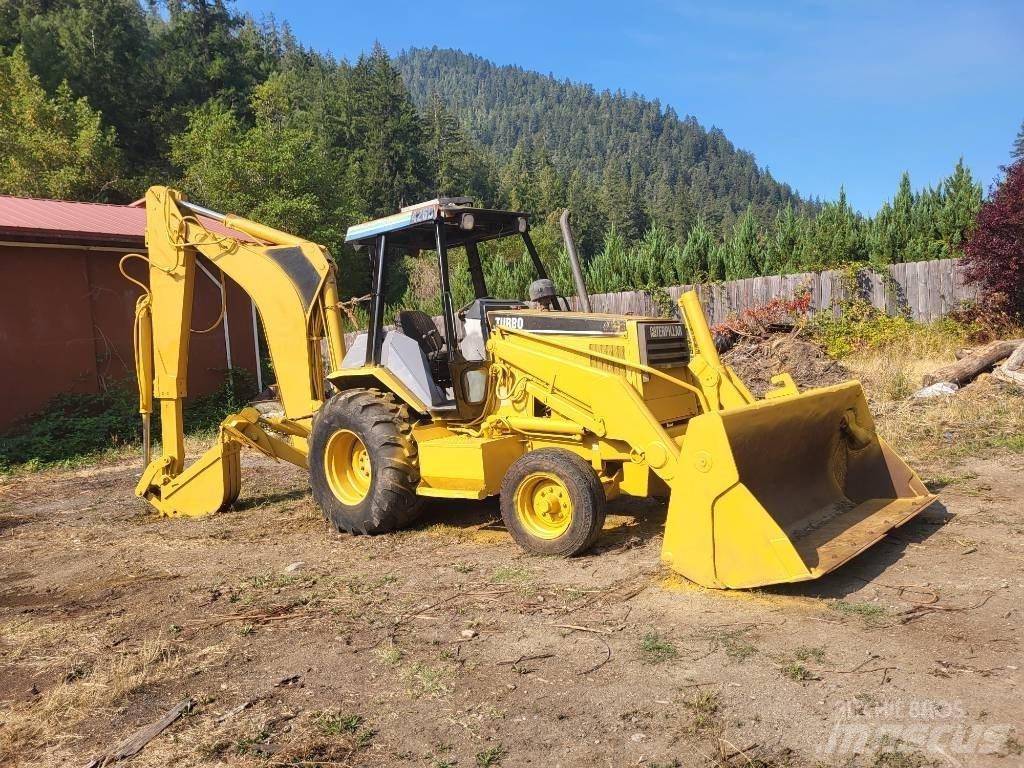 CAT 426B Екскаватори-навантажувачі