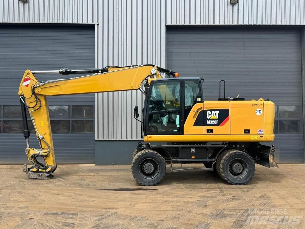 CAT M320F Колісні екскаватори