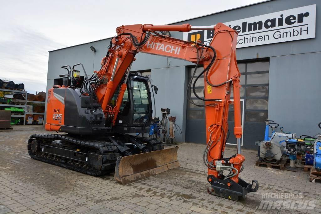 Hitachi ZX 135 US-7 Гусеничні екскаватори