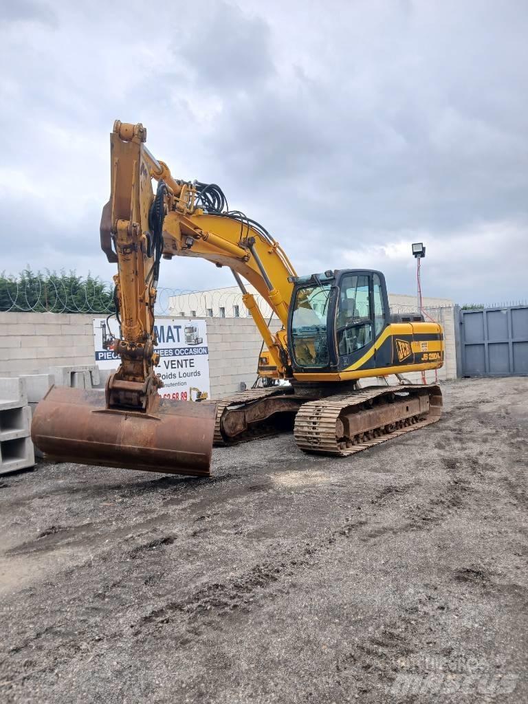 JCB JS 210 Гусеничні екскаватори