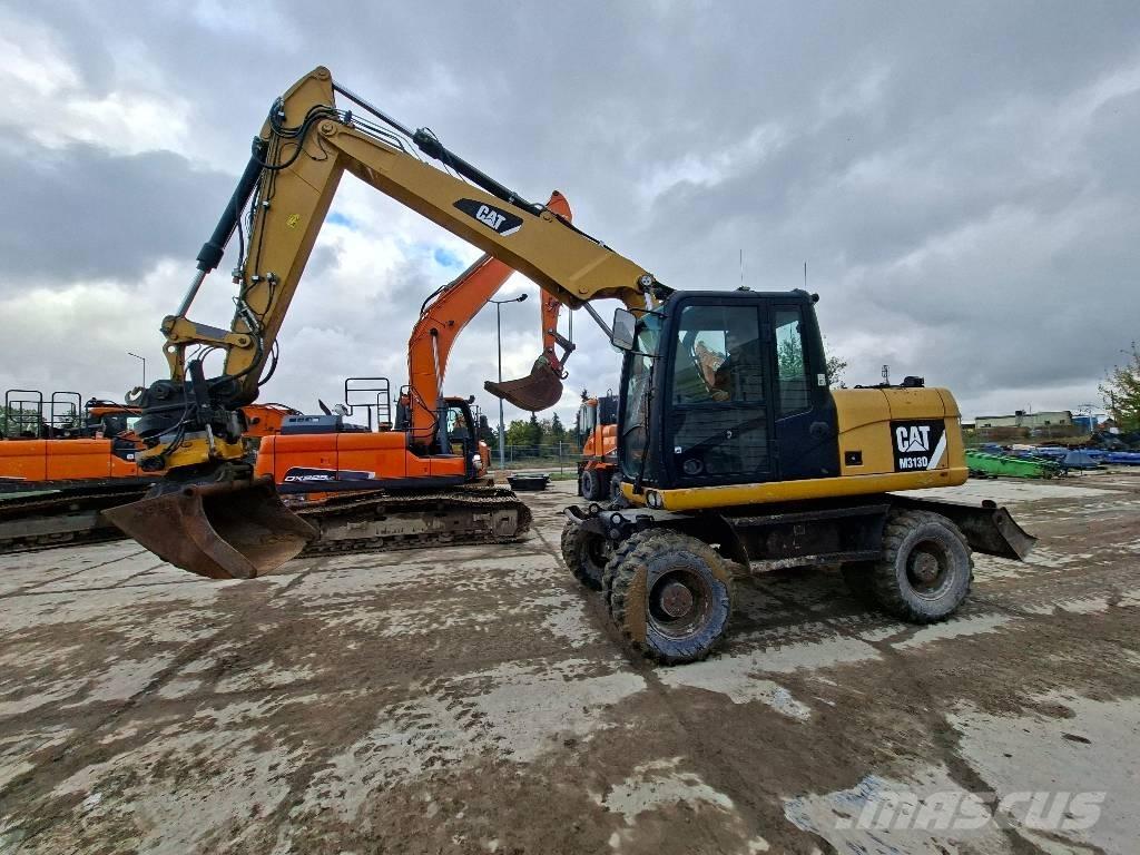 CAT M313D Колісні екскаватори
